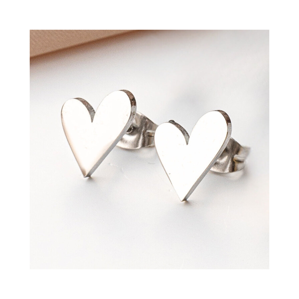 Tilted Heart Stud Earrings